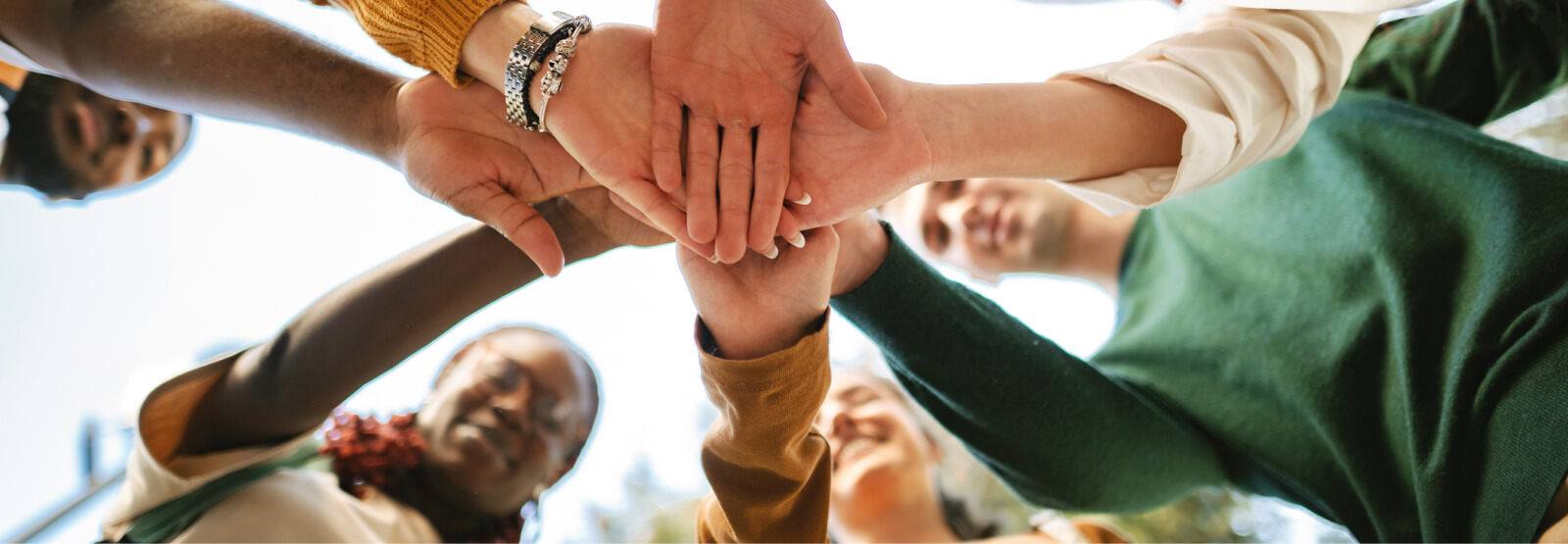 hands stacked in teamwork